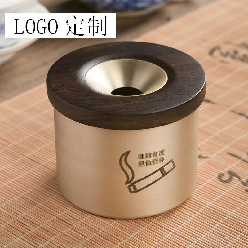 Retro solid copper ashtray with a wooden lid showing the centre hole.