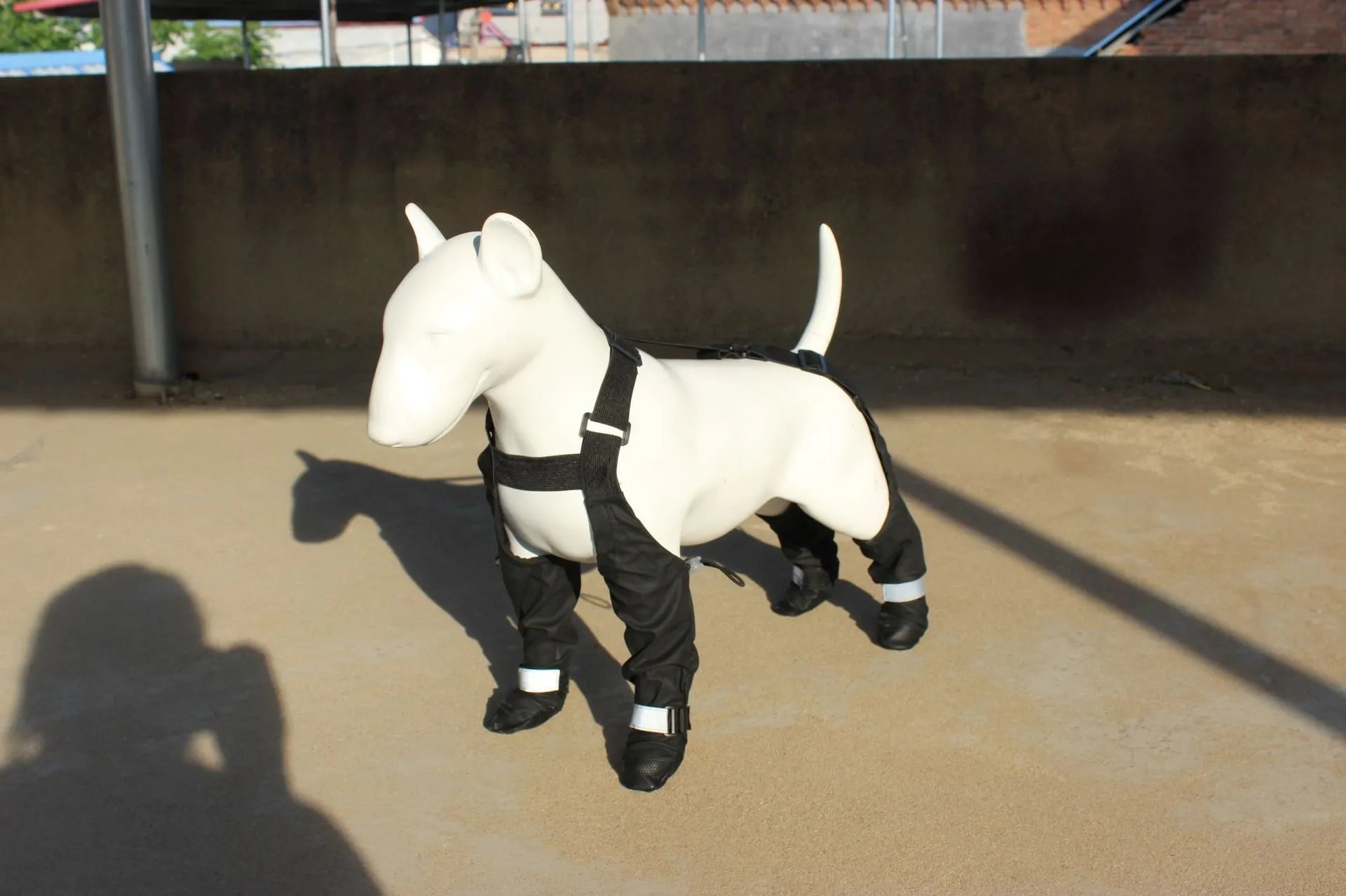 Black waterproof non-slip dog shoes in polyester material showing paw protection design