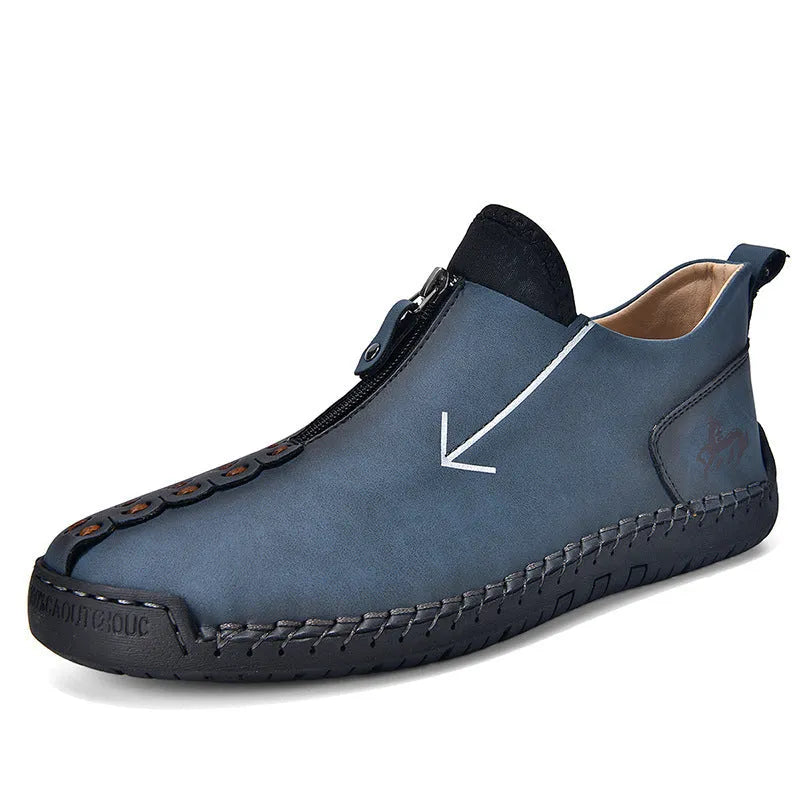 Men's black zip-up casual leather boots with round toe and hand-stitched rubber sole.