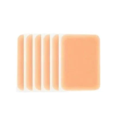 A 130mm long by 8.5mm wide makeup brush for covering tattoos and birthmarks, shown in a light flesh colour.