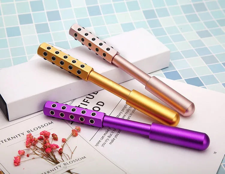 Germanium particles roller beauty massage instrument in purple colour for facial and eye treatment