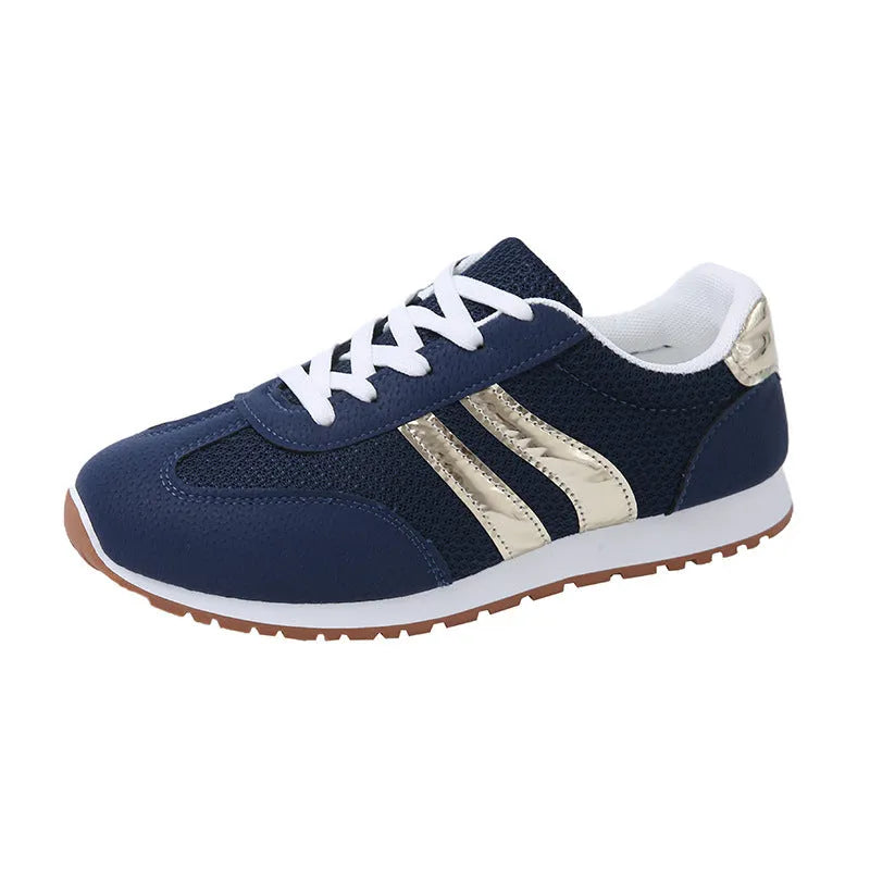 Blue women's casual sports trainers with cross shoulder straps and a white non-slip rubber sole.