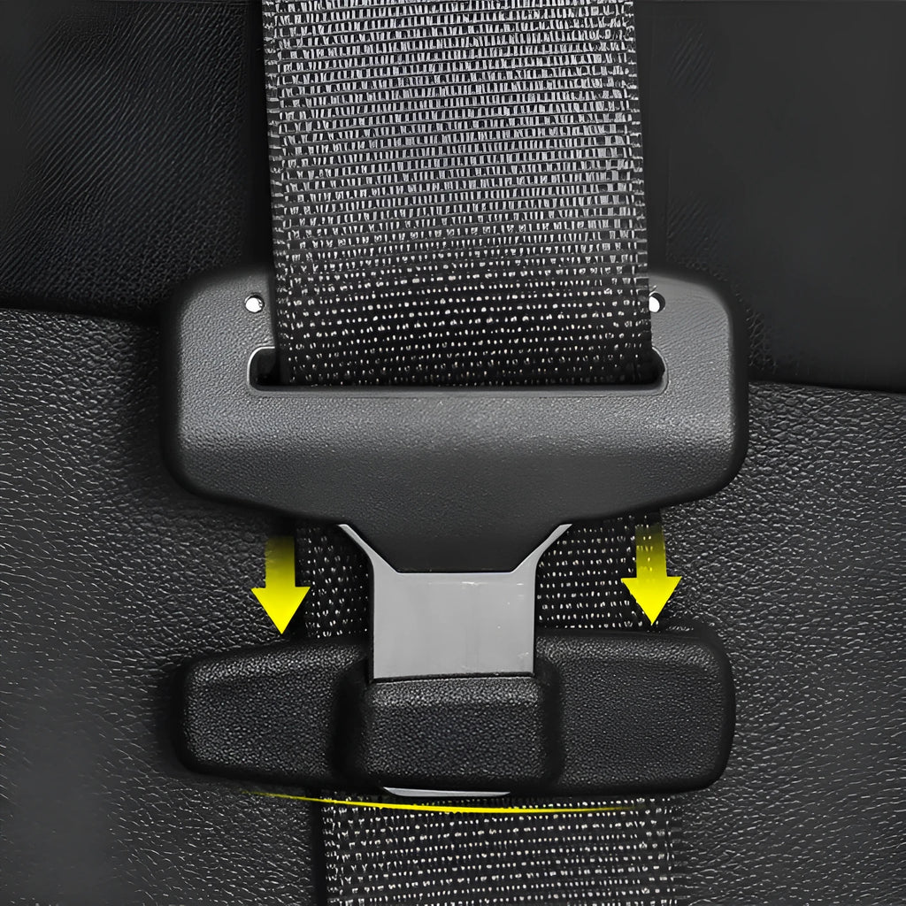 Black ABS plastic car seatbelt stopper clip preventing belt retraction
