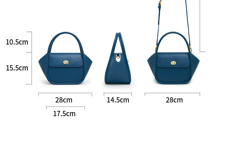 A wing-shaped women's leather tote bag with a buckle latch, shown in blue with a cross-body strap.
