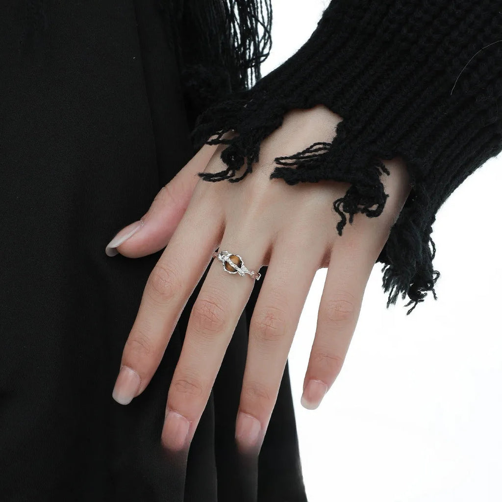 Women's Saturn open ring with adjustable size and electroplated white gold finish