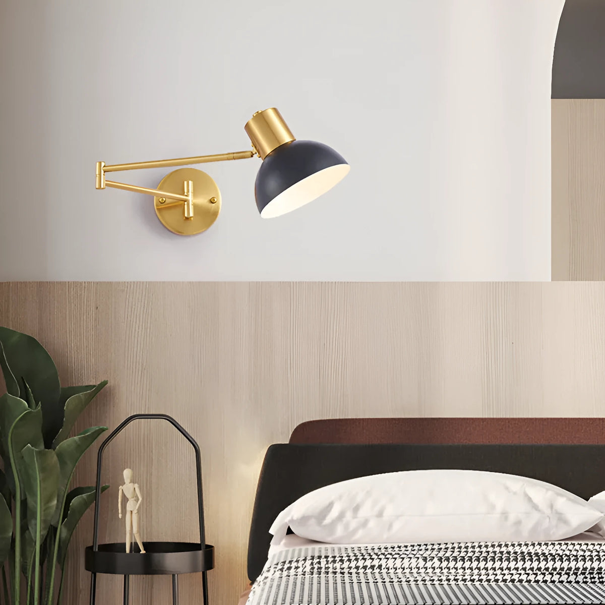 Modern minimalist double-section adjustable rocker arm wall lamp mounted on a wall.