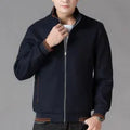 Men's grey sports-style wool fleece jacket with long sleeves and a stick pocket.