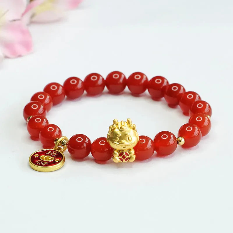 Red agate Chinese zodiac dragon bracelet with 8mm round beads on an adjustable cord.