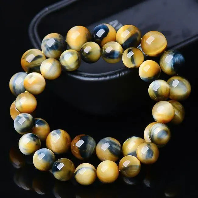 Handmade Fantasy Tiger Eye agate bracelet with round beads in geometric design.