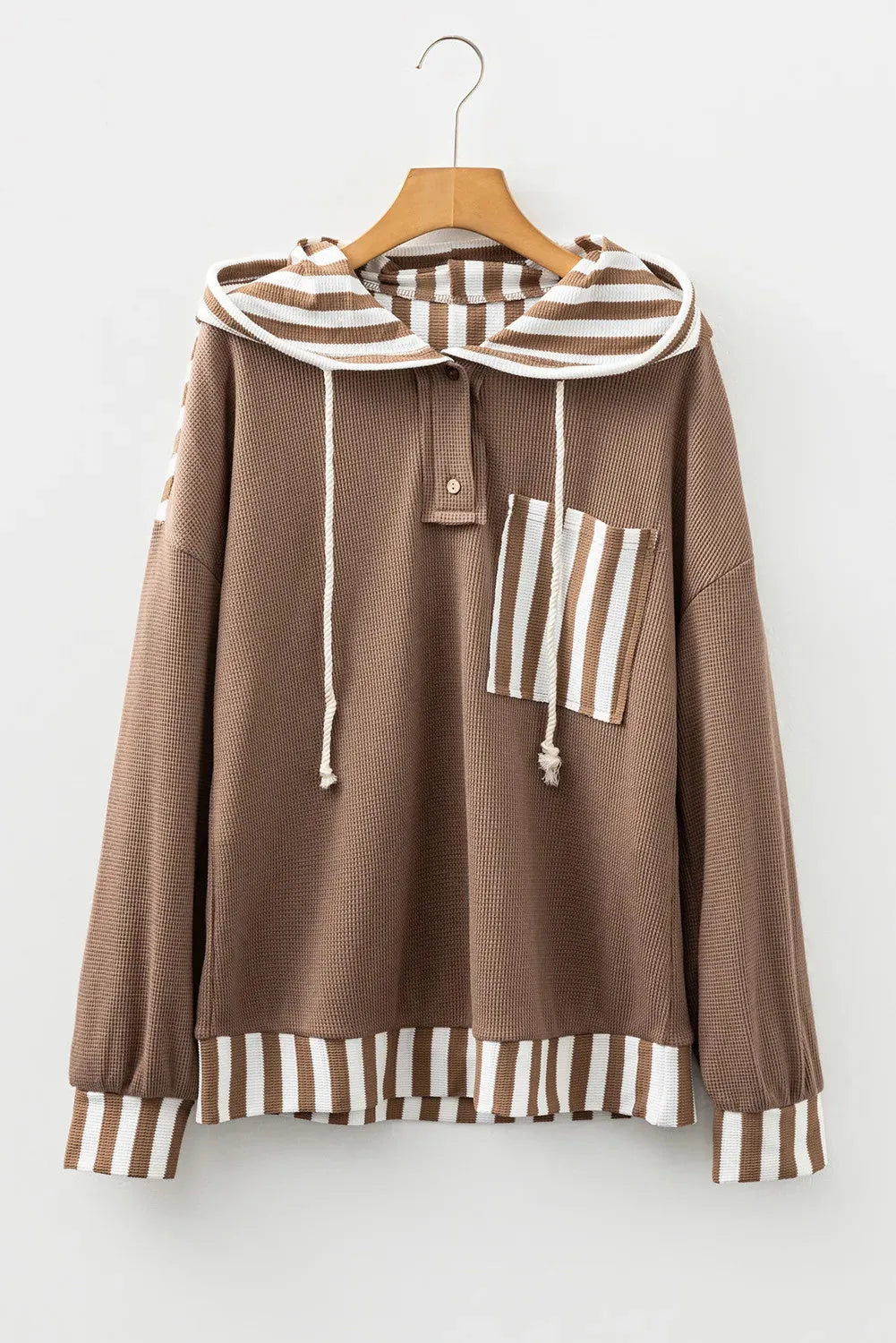 Straw yellow hoodie with waffle texture fabric and striped patchwork panels, button neck and drawstring waist