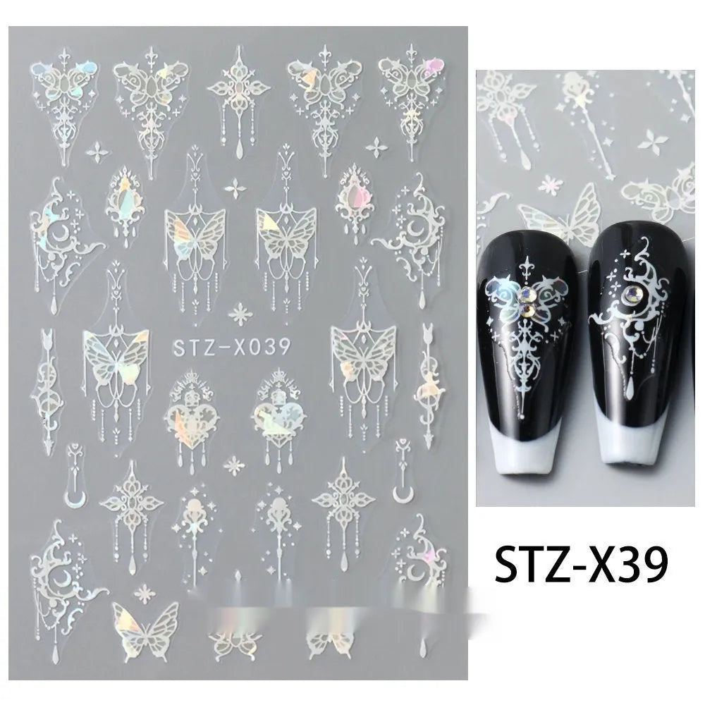 Black and silver love pattern nail art stickers on sheets for manicure decoration.
