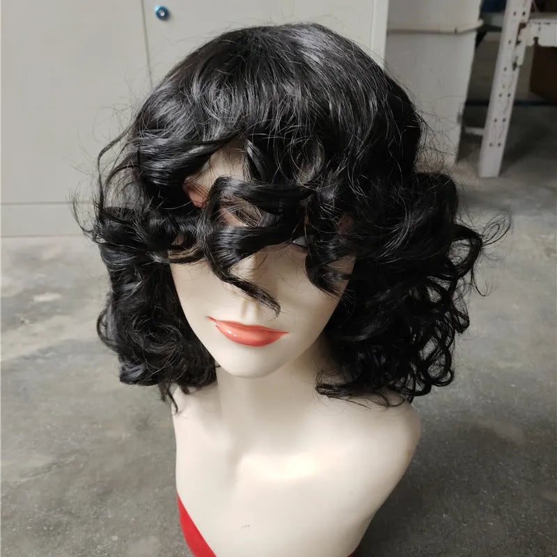 A woman wearing a long, black synthetic wig with tight Afro-textured curls.