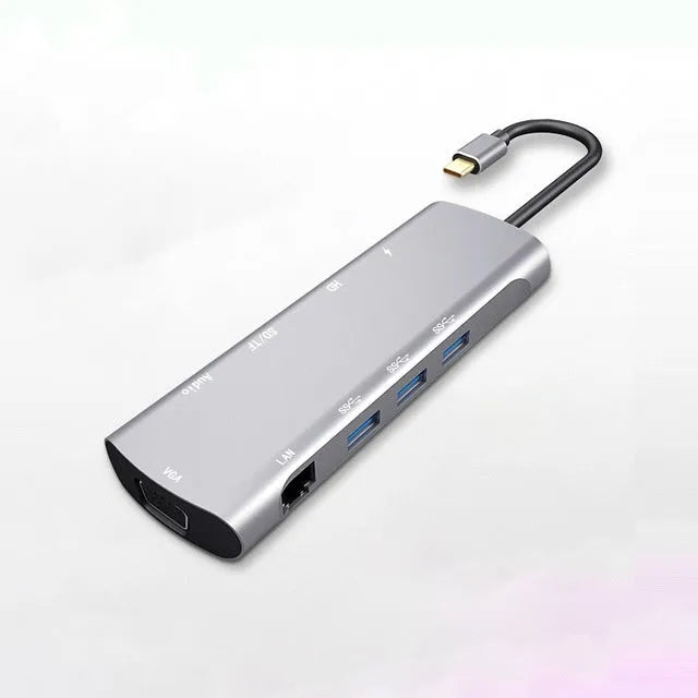 Grey USB C docking station with HDMI, VGA, and USB 3.0 ports for laptop connectivity