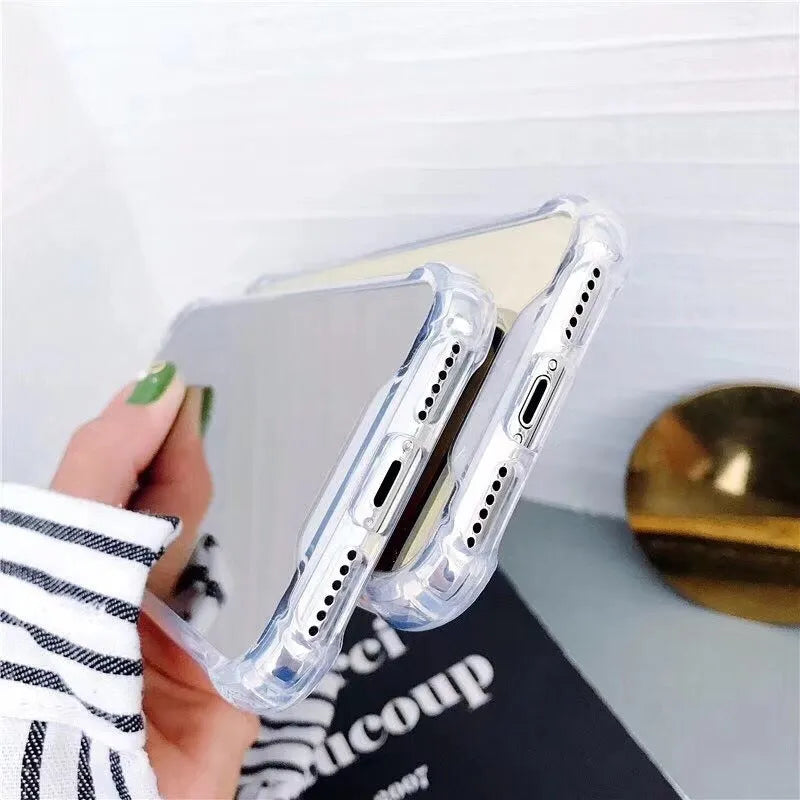 Mirror phone case for iPhone showing reflective back surface and soft TPU edges in multiple colour options.