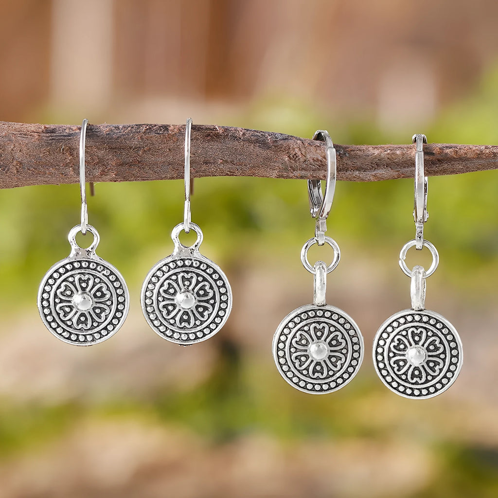Round geometric earrings with distressed ethnic print in electroplated zinc alloy