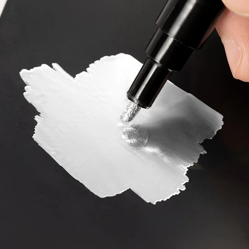 A plastic-bodied waterproof marker pen for writing on glass and mirrors, shown with a choice of 1mm or 2mm nib tip.