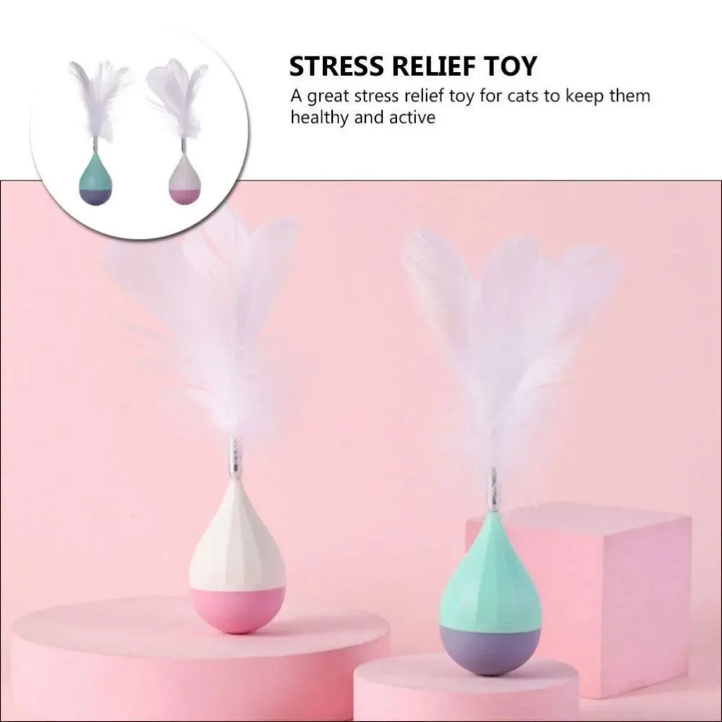 Green and pink feather tumbler cat toy with self-healing design