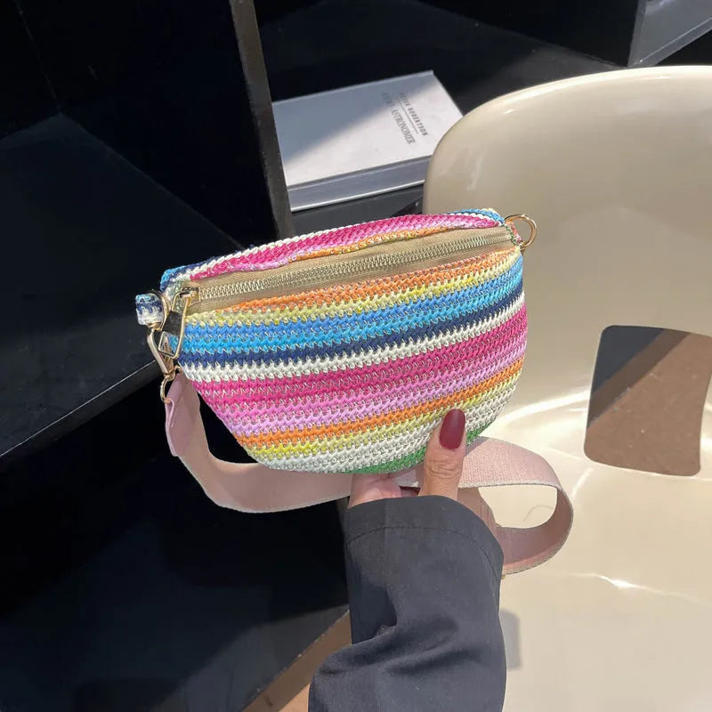 Blue and pink woven straw beach bag with shell shape and single shoulder strap