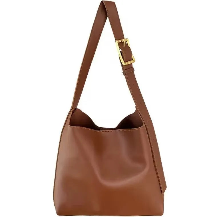 Women's soft PU shoulder bag with swing thread detail in black or brown colour