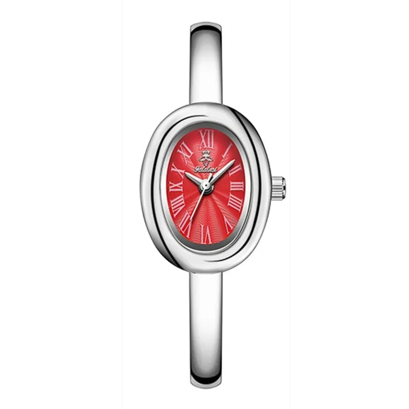 Women's oval retro quartz watch in gold colour with spiral pattern dial, showing 8mm thickness