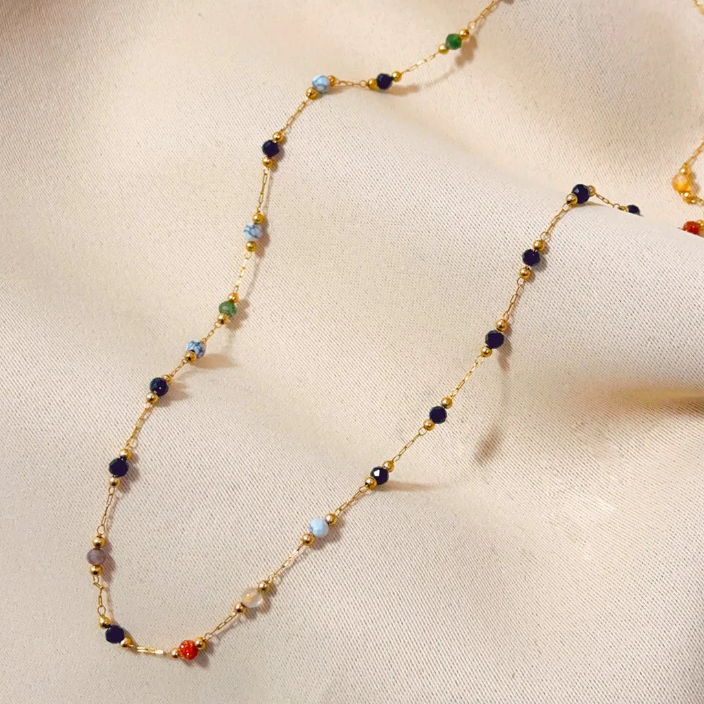 Women's gold titanium steel necklace with natural stone pendant on O-ring chain