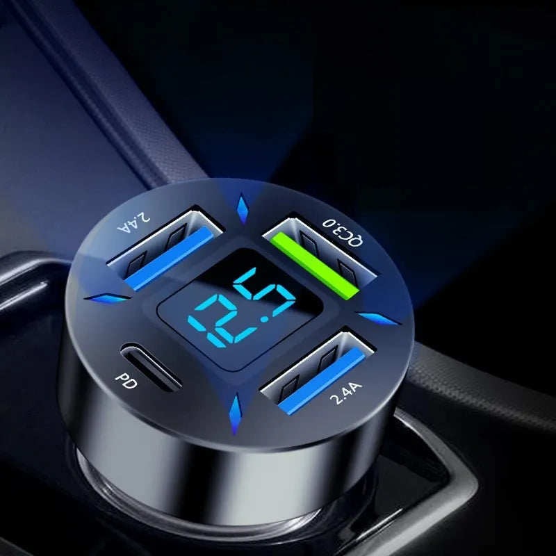 Black four-port car charger with digital display showing charging status