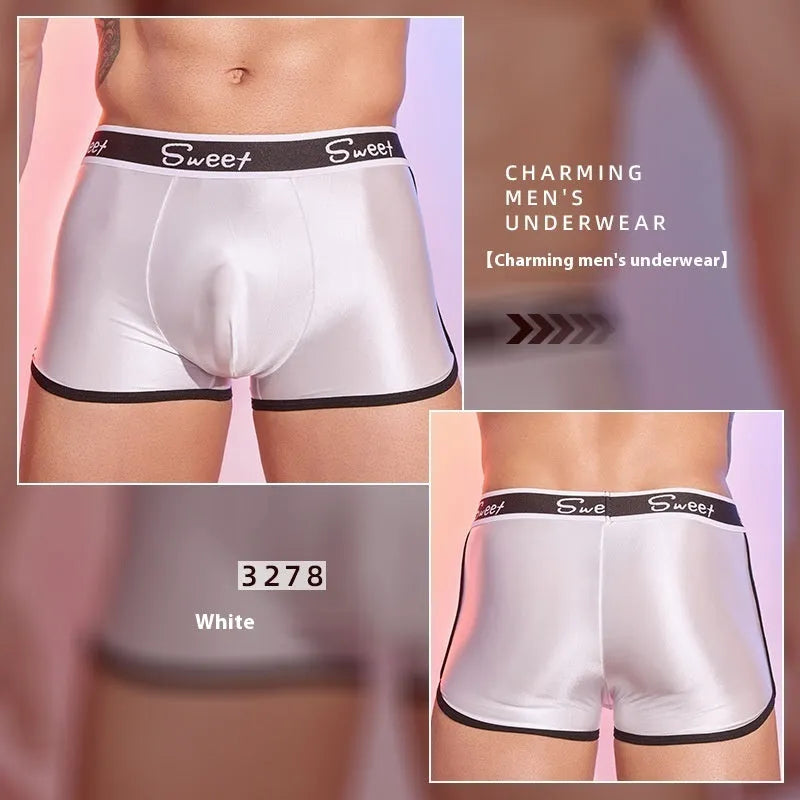 Man wearing shiny silky black nylon boxers, a pair of men's breathable underwear