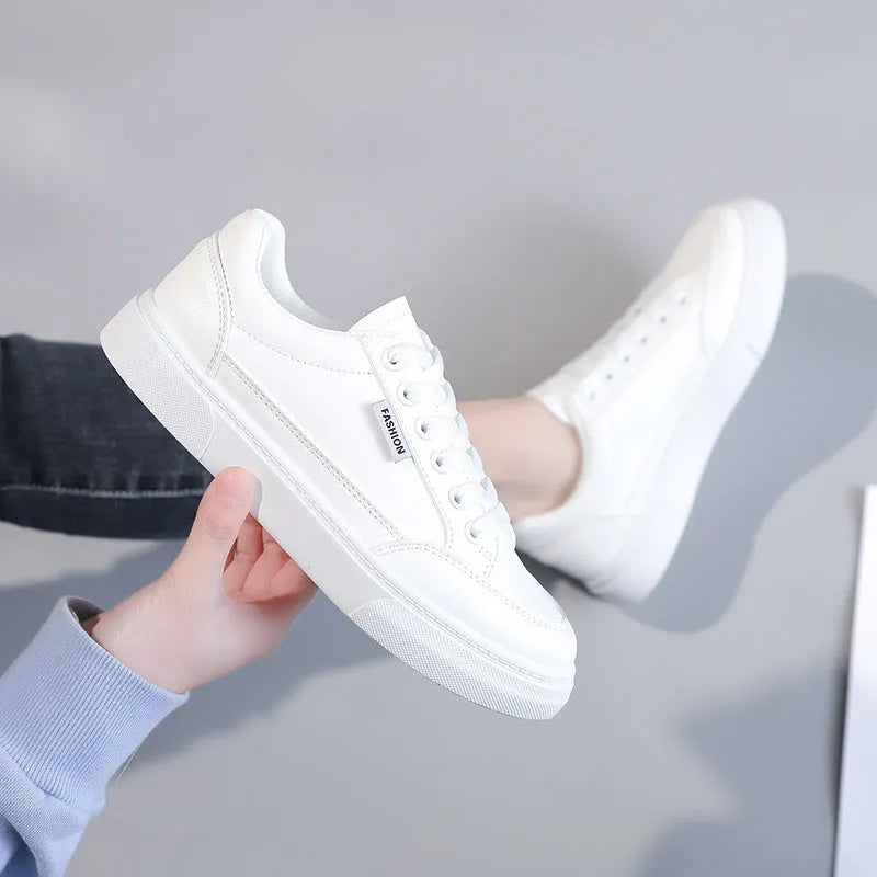 Korean style women's low-top sneakers in white and brown colours with artificial PU upper
