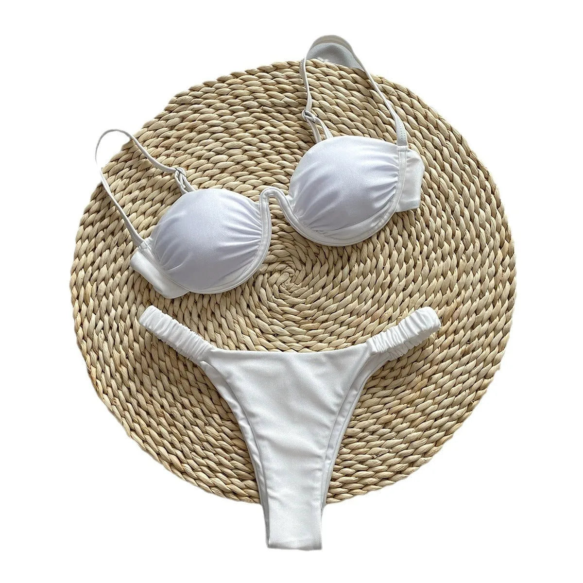 Women's black underwire bikini swimsuit with briefs on a neutral background