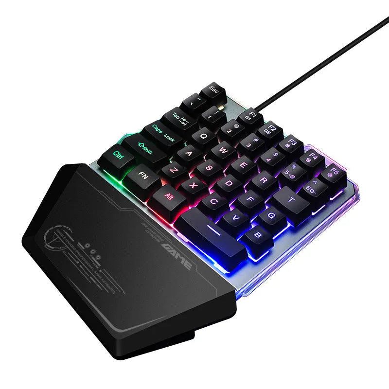 Black robotic one-handed gaming keyboard with RGB backlit keys and USB cable
