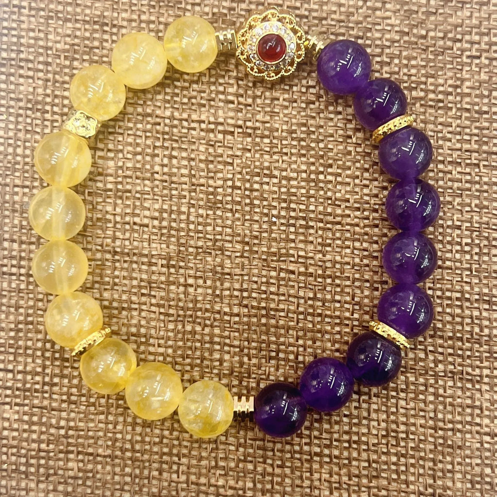 Handmade women's yellow and purple amethyst crystal bracelet with handcrafted details