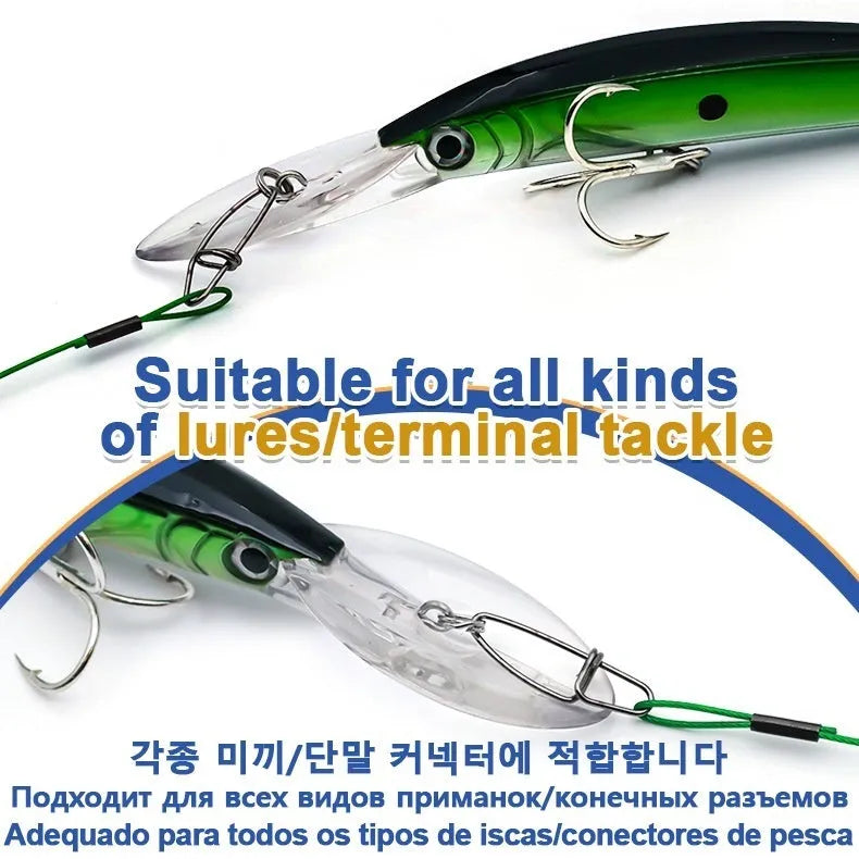 Ten green steel wire double buckle fishing leader pins laid out, each 54 cm long.