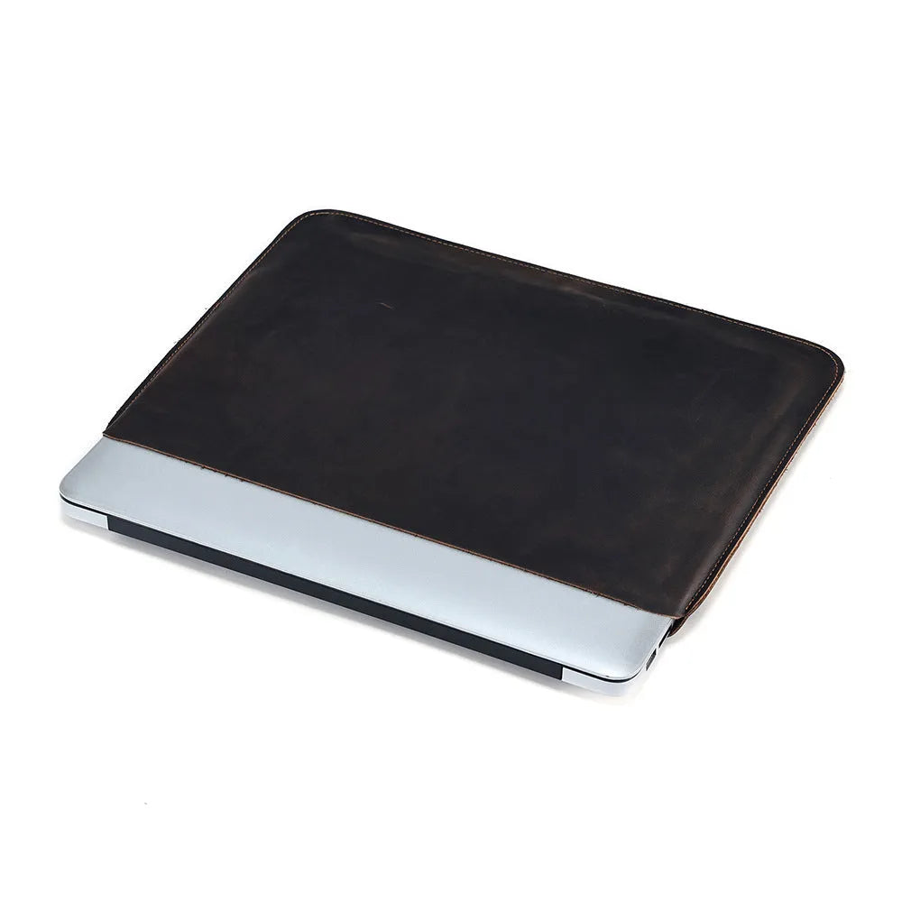 Brown genuine cowhide leather horizontal computer liner bag with a solid colour pattern.