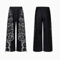 Printed loose trousers set with hoodie and seven-inch pants in street style with collage stitching details