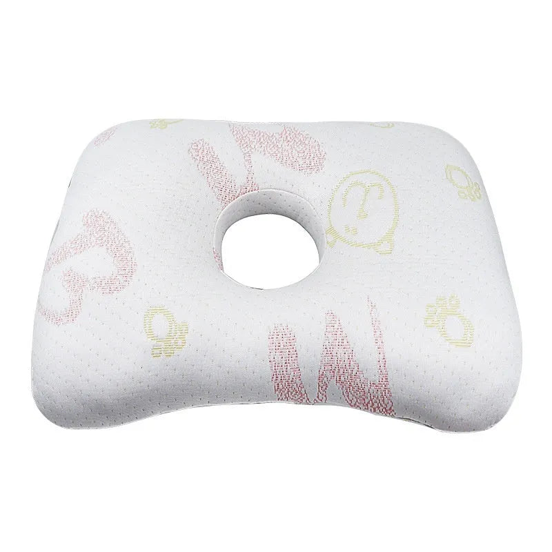 Beauty salon single hole ear pillow for adults in grey colour on a treatment bed.