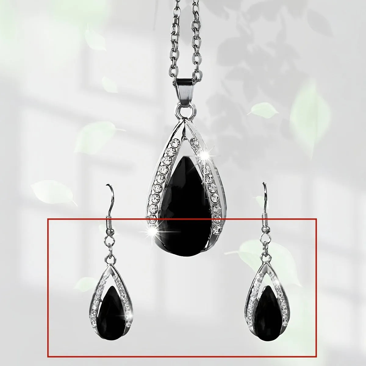 Alloy teardrop pendant necklace and earrings set in black or red colour options