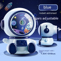 Blue cartoon astronaut manual pencil sharpener for children on a desk