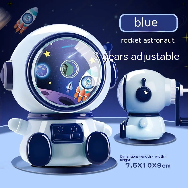 Blue cartoon astronaut manual pencil sharpener for children on a desk