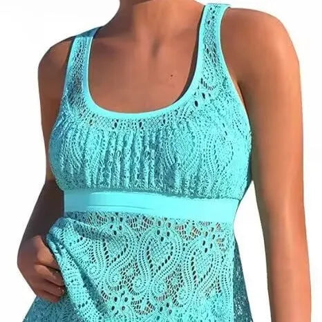 Women's two-piece nylon swimwear set with a sleeveless top and briefs in a solid colour.