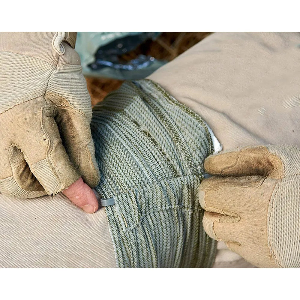 Portable hemostatic bandage kit containing tactical gauze tape in 4 inch or 6 inch sizes.
