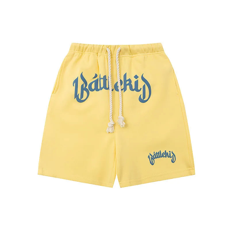 Loose grey cotton-blend streetwear shorts with a cropped sweatpants silhouette on a neutral background.