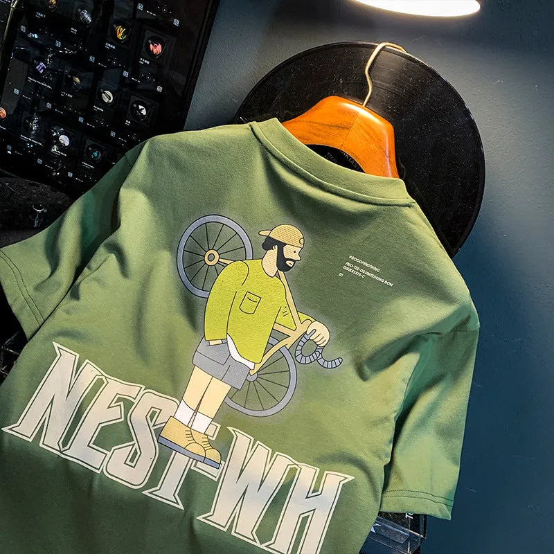 Green loose fit men's t-shirt with trendy printed design on short sleeves.