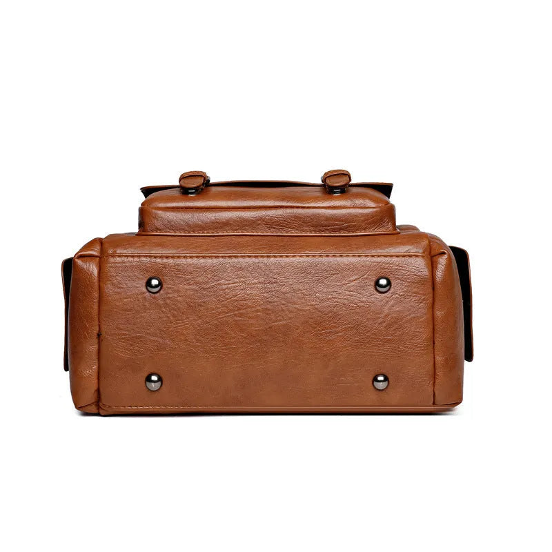 Large vintage messenger bag in PU leather with contrast stitching, shown in horizontal square shape.