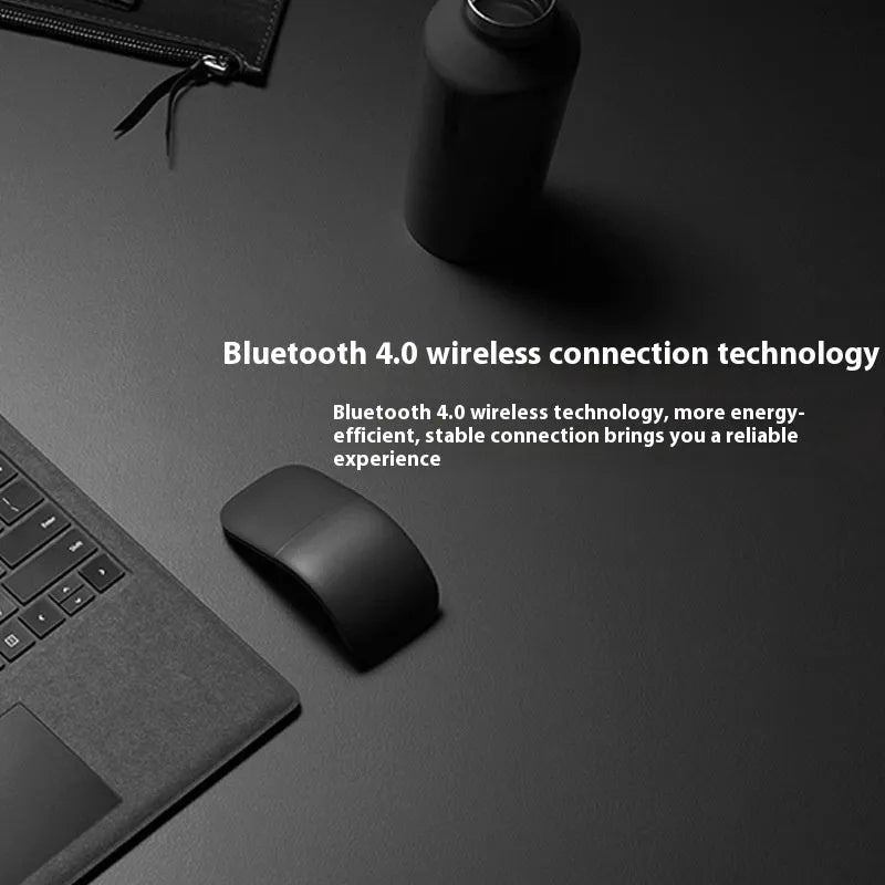 Black folding Bluetooth wireless mouse showing touch scroll area and compact folded size