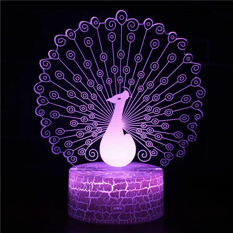 Small acrylic 3D touch-controlled USB table lamp with colourful crack-effect base on a desk.