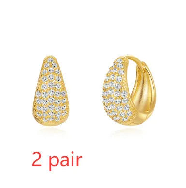 Geometric brass earclip earrings with round design in gold electroplated finish