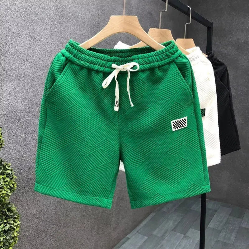 Casual polyester sports shorts with micro elasticity in white, black, or green colours