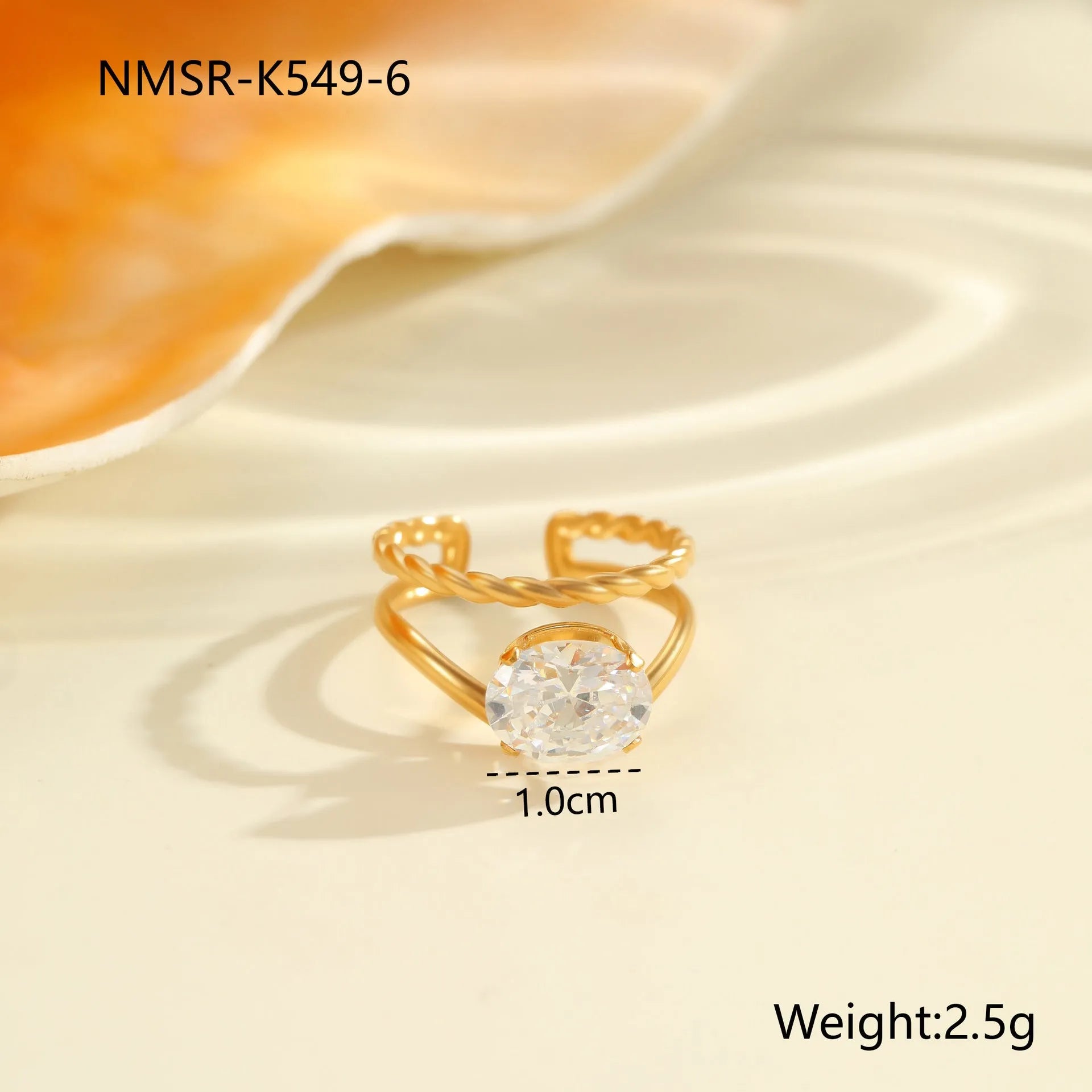 Geometric stainless steel open mouth ring with gold inlaid zircon detailing