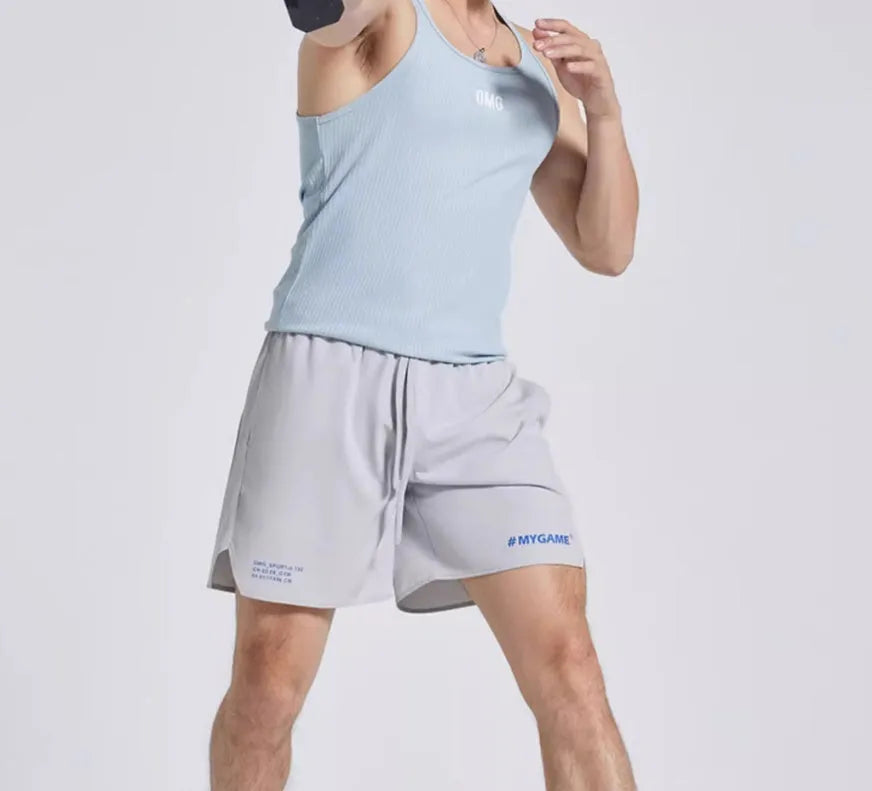 Men's blue training shorts with moisture-wicking fabric, shown from the side.
