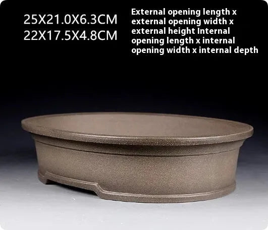 Handmade antique oval purple sand bonsai flower pot measuring 25x21x6.3cm